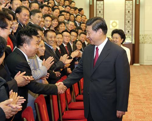 习近平会见全国援外医疗工作先进个人代表.jpg